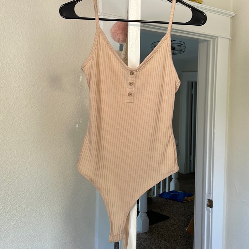 beige body suit
